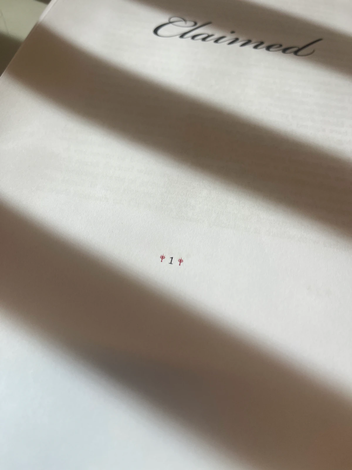 Alpha proof of the Claimed title page, striped with shadow from a window blind
