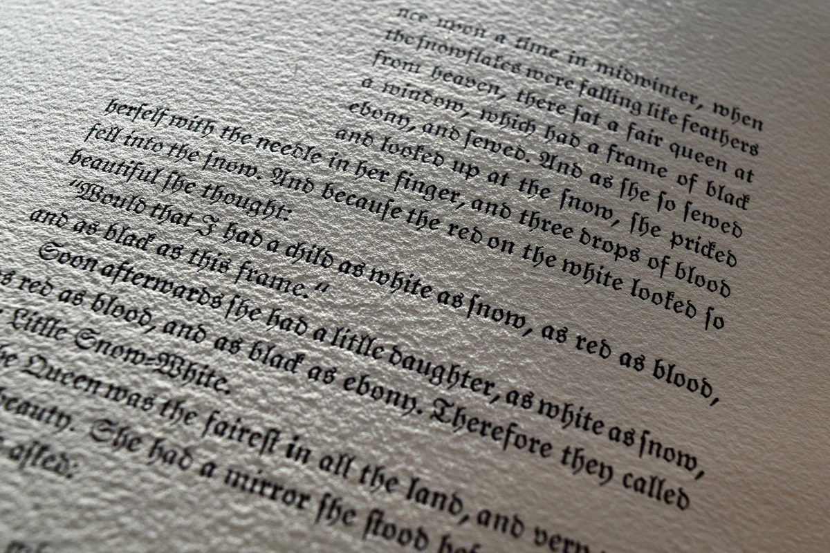 Proof of the opening of Little Snow-White, printed in Fraktur on textured mould-made paper
